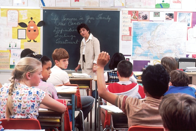 A classroom with a teacher and students